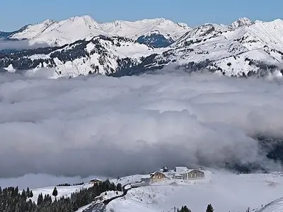 a view of a mountain with snow covered mountains at Appartement vue imprenable montagne in Samoëns