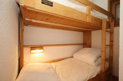 a couple of bunk beds in a small room at Résidence Les Hauts De Chavants - Hauts de chavants Albert 1er n°3 MAE-2651 in Les Houches