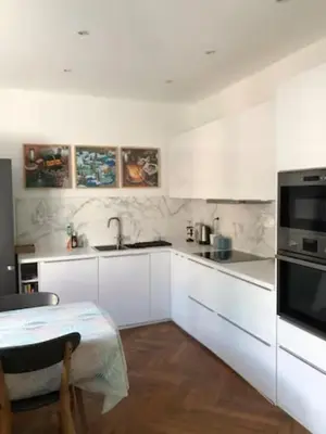 a white kitchen with a sink and a microwave at La Residence, Beautiful Comfort in Saint-Gervais-les-Bains
