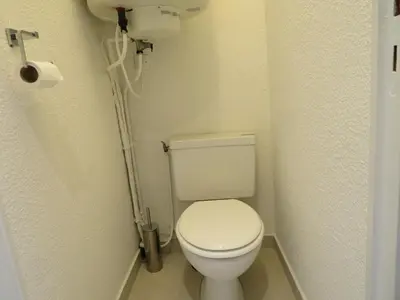 a small bathroom with a toilet in a room at Magnifique studio Megève in Megève