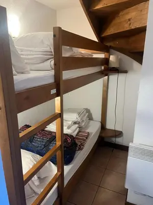 a couple of bunk beds in a room at Samoëns 2 in Samoëns