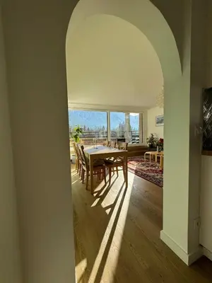 a dining room with a table and some chairs at MontBlancViewApartment in Chamonix-Mont-Blanc