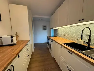 a kitchen with a sink and a counter top at MontBlancViewApartment in Chamonix-Mont-Blanc