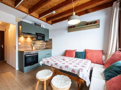 a living room with a couch and a table at Le Doina 2 N08 - ST5M in Morillon