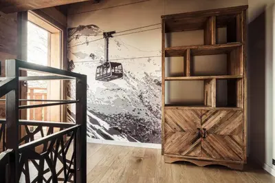 a wooden door in a room with a wall at La Combe Blanche - Balcon sur le Mont-Blanc in Combloux