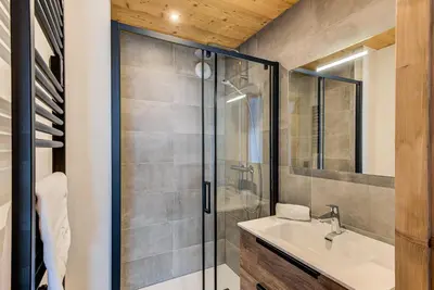 a bathroom with a sink and a shower at Apartment Annapurna, Alpes Travel, Les Houches, Sleeps 5 in Les Houches