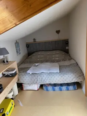 a bedroom with a bed in a attic at Cozy Apartment with Balcony Saint-Gervais in Saint-Gervais-les-Bains