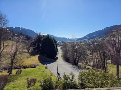 a view of a river from a hill at Chalet Jeane proche du Centre ville de Megève in Megève