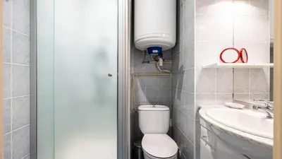 a small bathroom with a toilet and a sink at Grand Horizon 1 N401 - 3P6 in Morillon