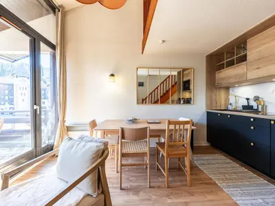 a kitchen and dining room with a table and chairs at Grand Horizon 1 N401 - 3P6 in Morillon