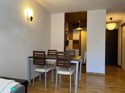 a dining room with a table and chairs at Mont Blanc Panorama in Chamonix-Mont-Blanc