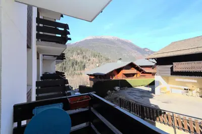 a balcony of a building with a view of a mountain at Résidence Les Esserts - Les Esserts MAE-3931 in Les Houches