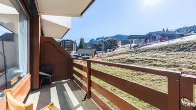 a balcony with a view of a hill at Les Eterlous N07 - 2P5 in Morillon