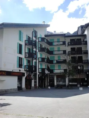 a large building with balconies on the side of it at Apartment Balme 3B - A Chamonix Mont Blanc Haven in Chamonix-Mont-Blanc