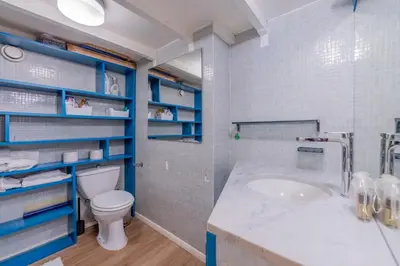 a bathroom with a toilet and a sink at Résidence Grand Roc - Ancolies 348 - Happy Rentals in Chamonix-Mont-Blanc