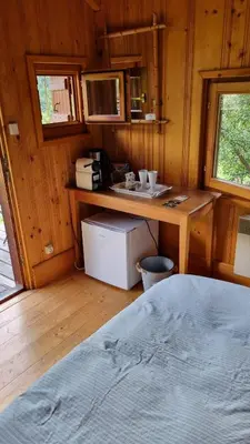 a small kitchen with a counter and a sink in a room at Petit mazot savoyard in Servoz