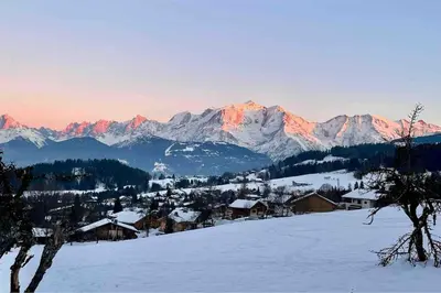 a view of a mountain range with a foggy valley at Le Refuge Alpin in Cordon