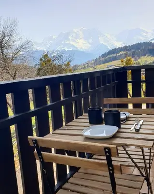 a kitchen with a sink and a counter top at Le Refuge Alpin in Cordon