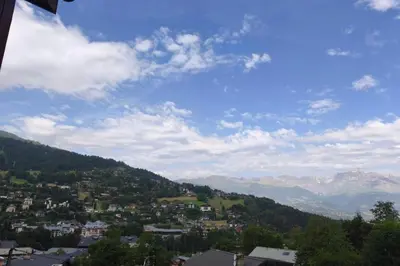a view of a town in a valley with mountains at Apartment near city center in Saint-Gervais-les-Bains