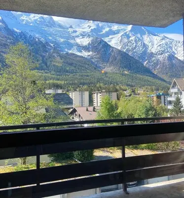 a view of a mountain range from a train window at Appartement Chamonix in Chamonix-Mont-Blanc