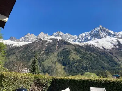 a view of a mountain with snow on it at Chamonix Centre - Sophisticated 2-Bedroom Duplex in Chamonix-Mont-Blanc