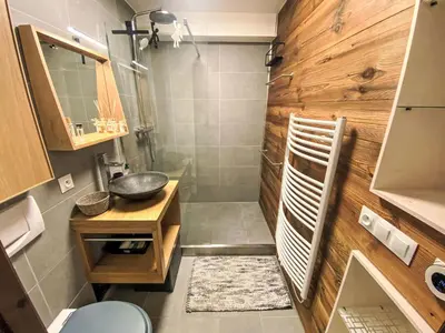 a small bathroom with a sink and a toilet at Apartment Les Grands Balcons by Interhome in Les Houches