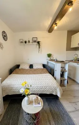 a blue sign that says were proud to be a traveller reviewagency winner at Charmant appartement à Saint-Gervais-les-Bains, idéal pour vos vacances à la montagne in Saint-Gervais-les-Bains