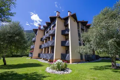 a ski lift with a sign that reads es grand amps winds at Résidence Grand Roc - Ancolies - Happy Rentals in Chamonix-Mont-Blanc