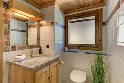 a bathroom with a sink and a mirror at Apartment Soleil, Alpes Travel, Argentière, Sleeps 9 in Chamonix-Mont-Blanc