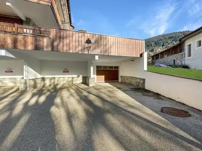 a rendering of a house with a driveway at ROUS02 Appartement 6 8 personnes au centre station in Les Carroz d'Araches