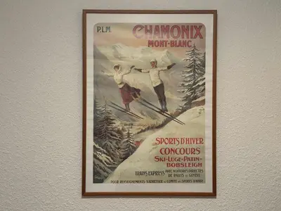a framed poster of two people skiing on a mountain at Appartement 1 chambre, coin montagne, vue pistes, 4-6 pers, sud, skis - FR-1-642-102 in Morillon