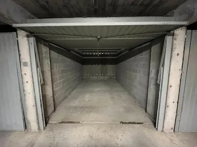 an empty basement room with a brick wall at Duplex Saint Gervais in Saint-Gervais-les-Bains