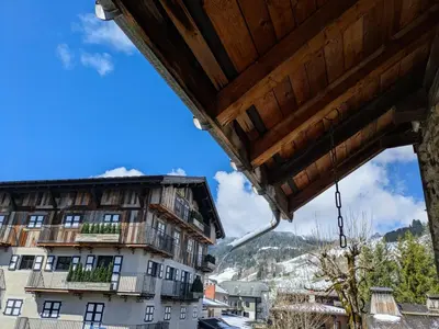 a view from the balcony of a building at Appartement Nuage, Luxe, centre village Megève in Megève