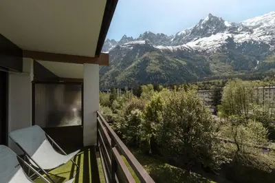 a balcony with a view of a snowy mountain at Cristal des Glaces 3 - Proche lac - Vues in Chamonix-Mont-Blanc