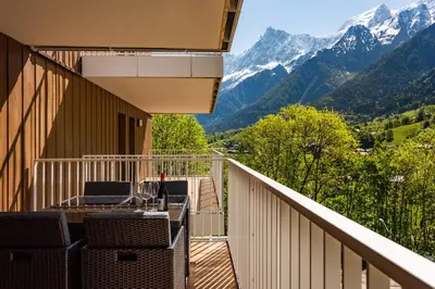 a balcony with a view of mountains at Mazot de Kayla, Alpes Travel, Les Houches, Sleeps 4 in Les Houches