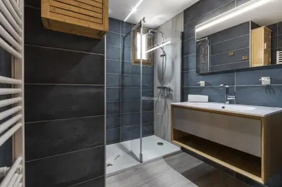 a bathroom with a sink and a shower at Tout Schuss - Centre St Gervais - Vue degagee in Saint-Gervais-les-Bains