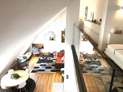 a room with a staircase and a living room at Duplex avec vue Mont-Blanc, centre ville Chamonix in Chamonix-Mont-Blanc