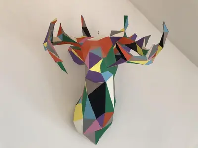 a colorful geometricaffe hanging on a wall at Duplex avec vue Mont-Blanc, centre ville Chamonix in Chamonix-Mont-Blanc