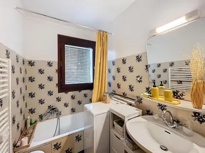 a bathroom with a sink and a mirror at Appartement 2 pièces au pied des pistes à Combloux - FR-1-560-162 in Combloux