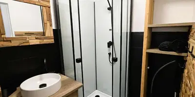a bathroom with a toilet and a sink at Joli studio avec terrasse in Sallanches
