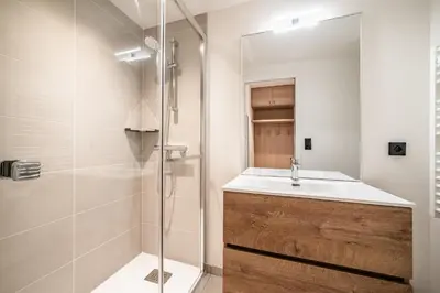 a bathroom with a sink and a shower at Apartment Houchma Les Houches - by EMERALD STAY in Les Houches