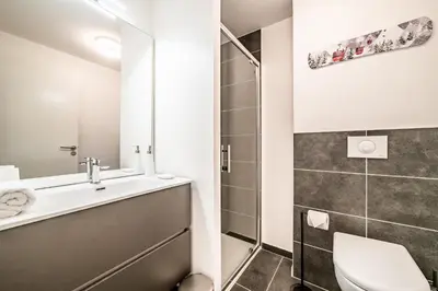 a bathroom with a sink and a toilet at Apartment Mathilde Les Houches - by EMERALD STAY in Les Houches