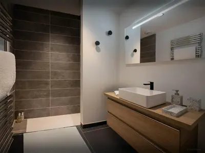 a bedroom with a bed and a window and a chair at Chalet Ormiages - OVO Network in Saint-Gervais-les-Bains