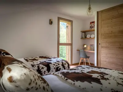 a bathroom with a bath tub and a sink at Chalet Ormiages - OVO Network in Saint-Gervais-les-Bains