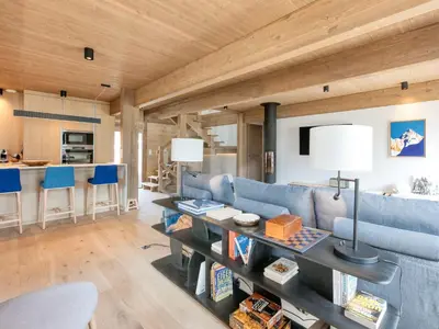 a kitchen with blue chairs and a large kitchen island at Chalet familial 5 chambres, proche ski, vue Mont-Blanc, parking et WiFi - FR-1-663-28 in Saint-Gervais-les-Bains