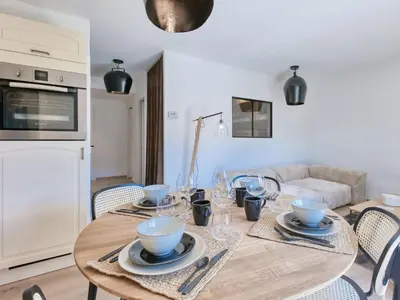 a room with a window with a desk and a bed at Saint-Gervais : Appartement rénové 2 ch, jardin, WiFi & parking - FR-1-663-34 in Saint-Gervais-les-Bains