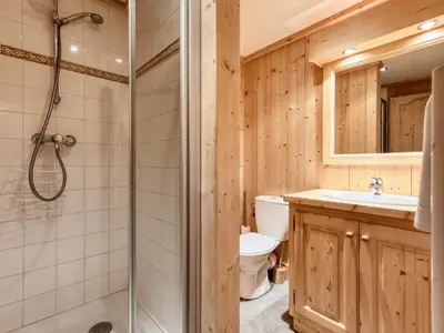 a living room with a couch and a table at Chalet familial à Saint-Gervais, 6 chambres, 12 pers, WiFi, parking - FR-1-663-27 in Saint-Gervais-les-Bains