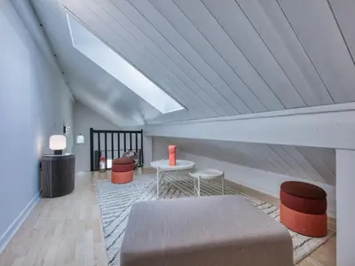 a kitchen with red cabinets and a stove top oven at Duplex 83m², 3 chambres, 6 pers, centre Saint-Gervais, à 5 min de la télécabine, Wifi inclus - FR-1-663-31 in Saint-Gervais-les-Bains