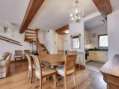 a kitchen with a sink and a clock on the wall at Appartement duplex avec vue montagne, 8 pers, parking, Wi-Fi - FR-1-663-36 in Saint-Gervais-les-Bains