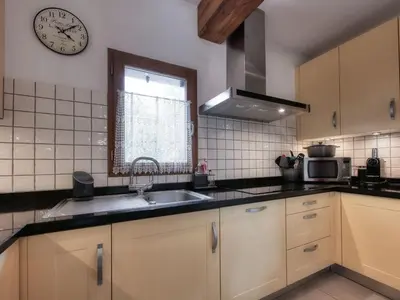 a bathroom with a tub and a shower and a sink at Appartement duplex avec vue montagne, 8 pers, parking, Wi-Fi - FR-1-663-36 in Saint-Gervais-les-Bains